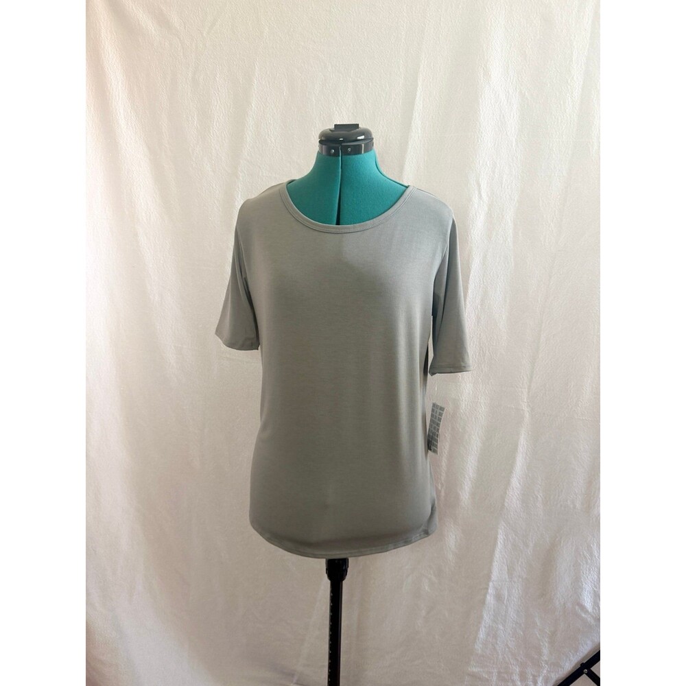 NWT Lularoe Gigi top size large. Brand new with tags. Size large.